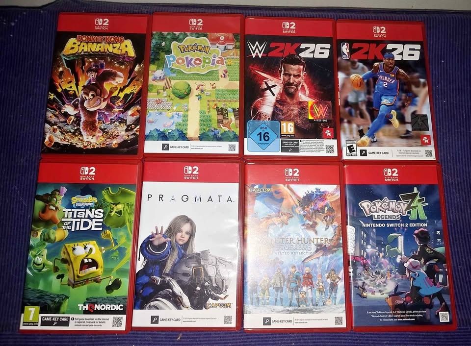 Nintendo Switch 2 physical game cartridges bundle (8 games) (Category: Nintendo) located in Pasay City. Submitted by safeturtle.eabb46 (Listing ID 1471028807, Image 1). Description: DK BANANZA - P2500 POKEMON POKOPIA BRAND NEW- P2300 W2K26 - P2200 NBA 2K26 - P1100 TITANS OF THE TIDE - P1100 PRAGMATA- P2300 MONSTER HUNTER RISE- P2000 POKEMON ZA- P2000 take all 13K.