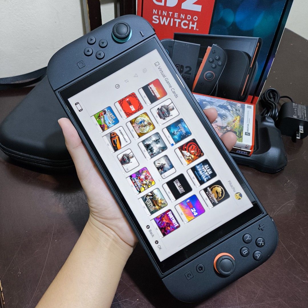 Nintendo Switch 2 with digital games (Category: Nintendo) located in Manila. Submitted by kmswitchhubph (Listing ID 1471016220, Image 3). Description: FOR SALE NINTENDO SWITCH 2 WITH DIGITAL GAMES | 256GB STORAGE Price: 28,500 ✨ CONDITION • Good as New • Well-maintained • Clean unit • Barely used • No issues / fully working • Some accessories remain untouched • Feels like buying a brand-new unit 📦 PACKAGE INCLUDES • Original Nintendo Switch 2 bo