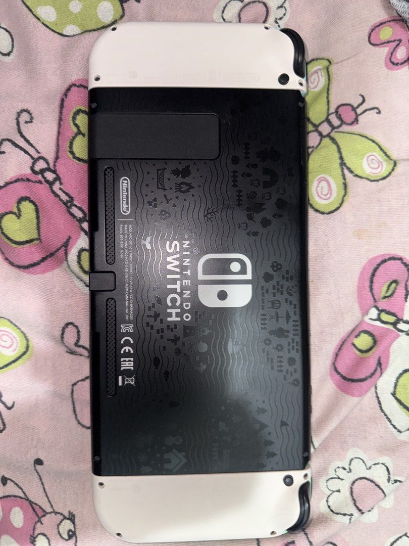 Nintendo Switch Animal Crossing Edition (Category: Nintendo) located in Cainta. Submitted by clengy612 (Listing ID 1471094666, Image 2). Description: - Special Edition Animal Crossing Nintendo Switch console - Pastel green and blue joy-cons attached - Custom dock with cute island graphics - Includes 128GB SanDisk microSD card and original power adapter - Screen has minor wear - 100% working condition and powers up normally Negotiable price RFS: M