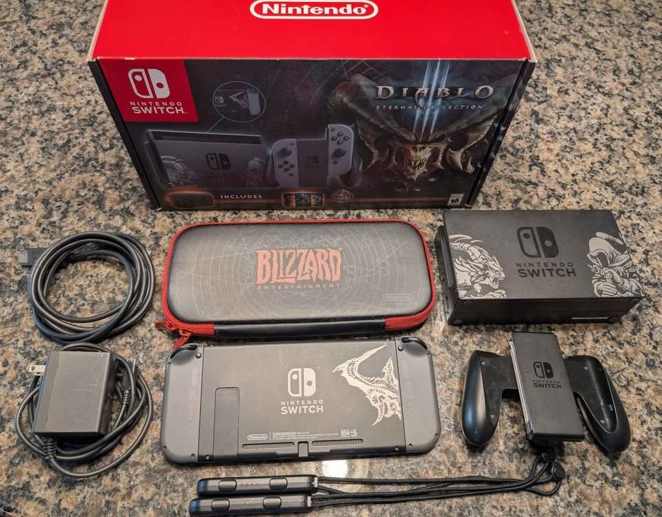 Nintendo Switch Diablo III • Limited Edition Console Bundle (Category: Nintendo) located in San Pablo. Submitted by nathanzvg (Listing ID 1470953369, Image 3). Description: Condition: Good Status: Available 🟢 Nintendo Switch Diablo III Limited Edition with 32GB storage and Diablo-themed design. Supports handheld, tabletop, and TV gaming. Pre-owned in good condition. Includes original box, dock, Joy-Cons, grip, straps, charger, HDMI cable, and Di