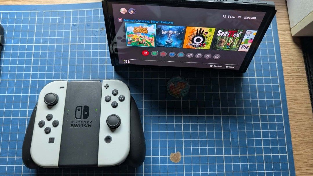 Nintendo Switch OLED White (Category: Nintendo) located in Cainta. Submitted by johnnydhipp (Listing ID 1470980440, Image 3). Description: • Display: 7-inch vibrant OLED screen with deeper blacks and higher contrast. • Storage: 64GB of internal storage • Dock: Updated dock featuring a built-in wired LAN/Ethernet port. • Stand: Wide, adjustable kickstand for tabletop mode. • Play Modes: TV mode (docked), tabletop mode, and handheld mode. * Comes w