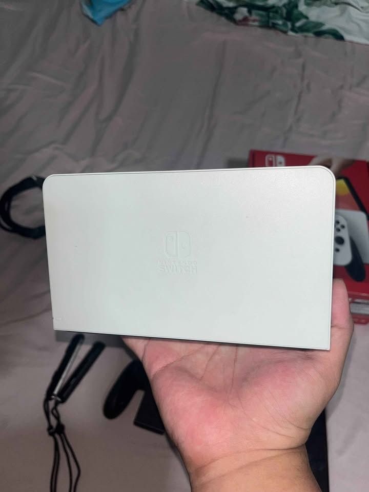 Nintendo Switch OLED (Category: Nintendo) located in Pasay City. Submitted by safeturtle.eabb46 (Listing ID 1470992122, Image 2). Description: Selling Nintendo Switch Oled Complete with Box (Non JB) Inclusion • Switch Console • Joycons • Dock • Hdmi (Not original) • AC Adapter • Joycons Grip • Joycons Wrist Strap Can do meet up nearby or halfway pasay area .