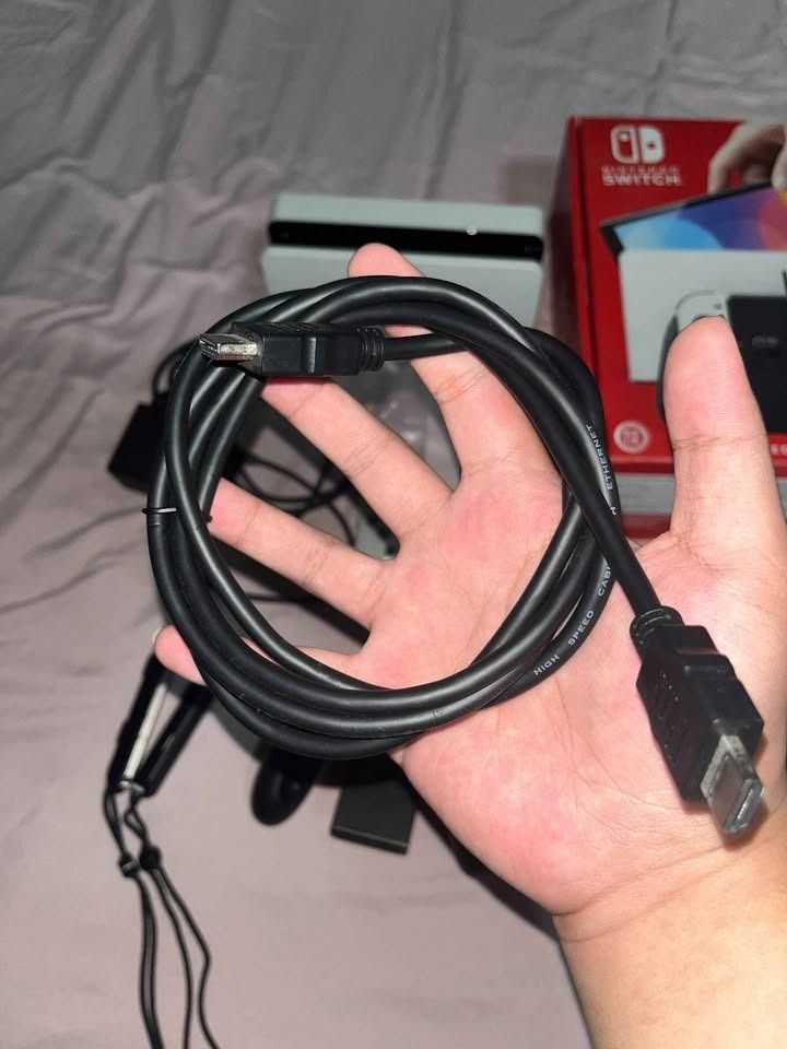 Nintendo Switch OLED (Category: Nintendo) located in Pasay City. Submitted by safeturtle.eabb46 (Listing ID 1470992122, Image 1). Description: Selling Nintendo Switch Oled Complete with Box (Non JB) Inclusion • Switch Console • Joycons • Dock • Hdmi (Not original) • AC Adapter • Joycons Grip • Joycons Wrist Strap Can do meet up nearby or halfway pasay area .