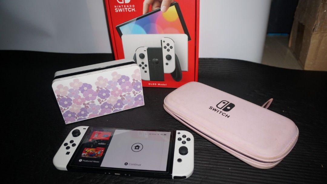 Nintendo Switch Oled White (Category: Nintendo) located in Manila. Submitted by shutter.clicker (Listing ID 1470990201, Image 2). Description: *** LAST PRICE POSTED❗❗❗ Lady owned NO MEMORY CARD INCLUDED FREE GAME: ANIMAL CROSSING NEW HORIZONS MOP: Gcash, Bank transfer para hindi hassle magdala ng cash Issue: White joycon(L) ghost touch yung L button can be remapped in the settings Inclusions: Box Switch OLED tempered installed Charger, HDMI cable