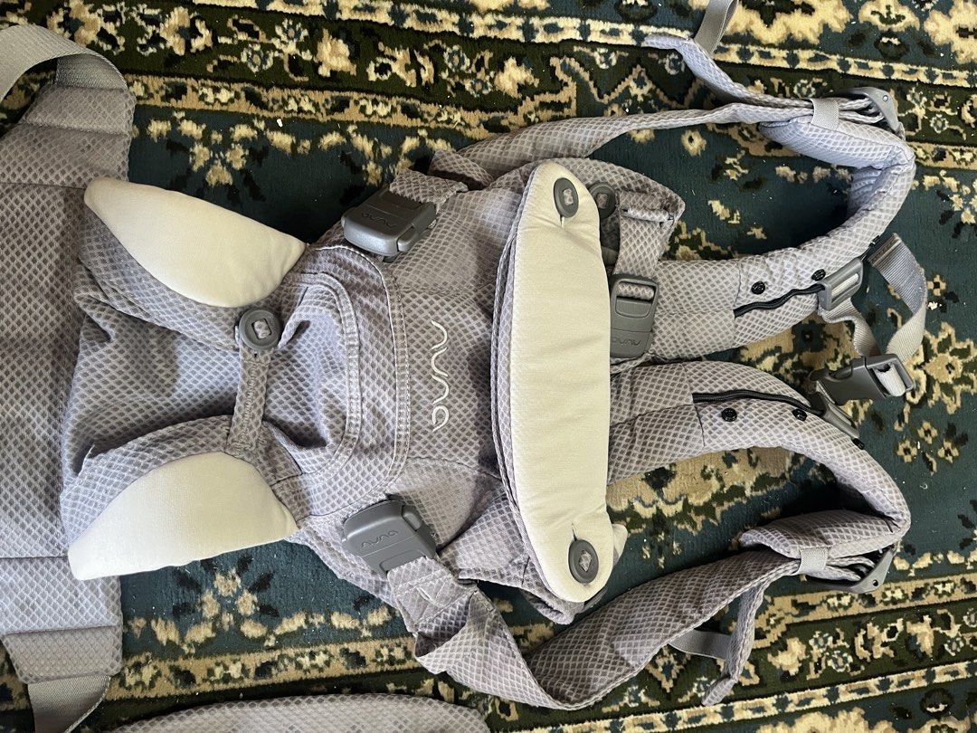Nuna Cudl Baby Carrier Grey (Category: Carriers & Slings) located in Manila. Submitted by batusaipus03057 (Listing ID 1471021839, Image 3). Description: Permission to Post Admin Nuna CUDL Clik baby Carrier Key FeaturesMaterial: Breathable mesh fabric designed to keep both parent and baby cool.Buckles: Magnetic locking buckles that click securely and easily into place. Support: Padded shoulder straps and a wide, supportive waist belt to reduce str