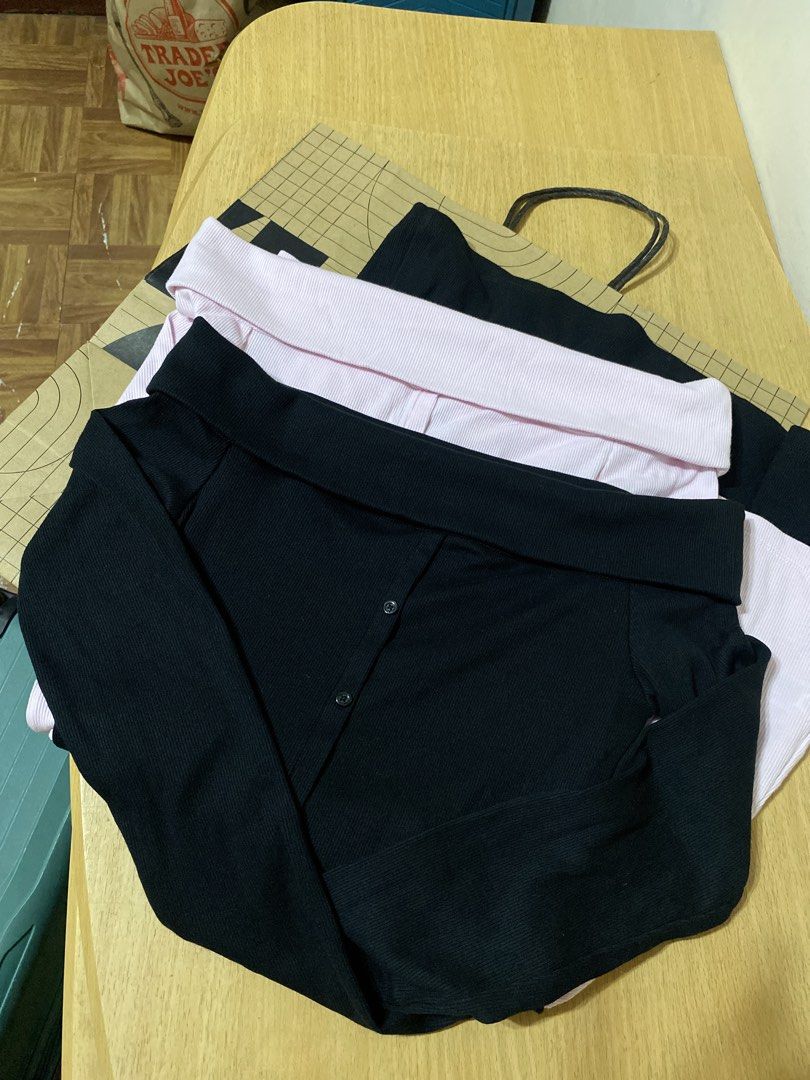 Off-shoulder ribbed button-down dresses black and pink (Category: Dresses) located in Batangas. Submitted by lux_kimmy (Listing ID 1470965808, Image 2). Description: - Set of 2 dresses: Black and Pink - Style: Off-shoulder with chic foldover neckline and long sleeves - Detail: Functional front buttons - Fabric: Super stretchy, soft, and comfortable - Occasion: Great for casual daily wear or going out.