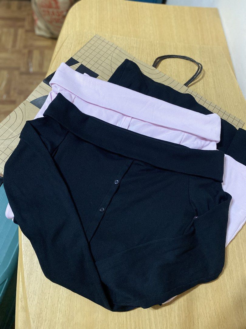 Off-shoulder ribbed button-down dresses black and pink (Category: Dresses) located in Batangas. Submitted by lux_kimmy (Listing ID 1470965808, Image 3). Description: - Set of 2 dresses: Black and Pink - Style: Off-shoulder with chic foldover neckline and long sleeves - Detail: Functional front buttons - Fabric: Super stretchy, soft, and comfortable - Occasion: Great for casual daily wear or going out.