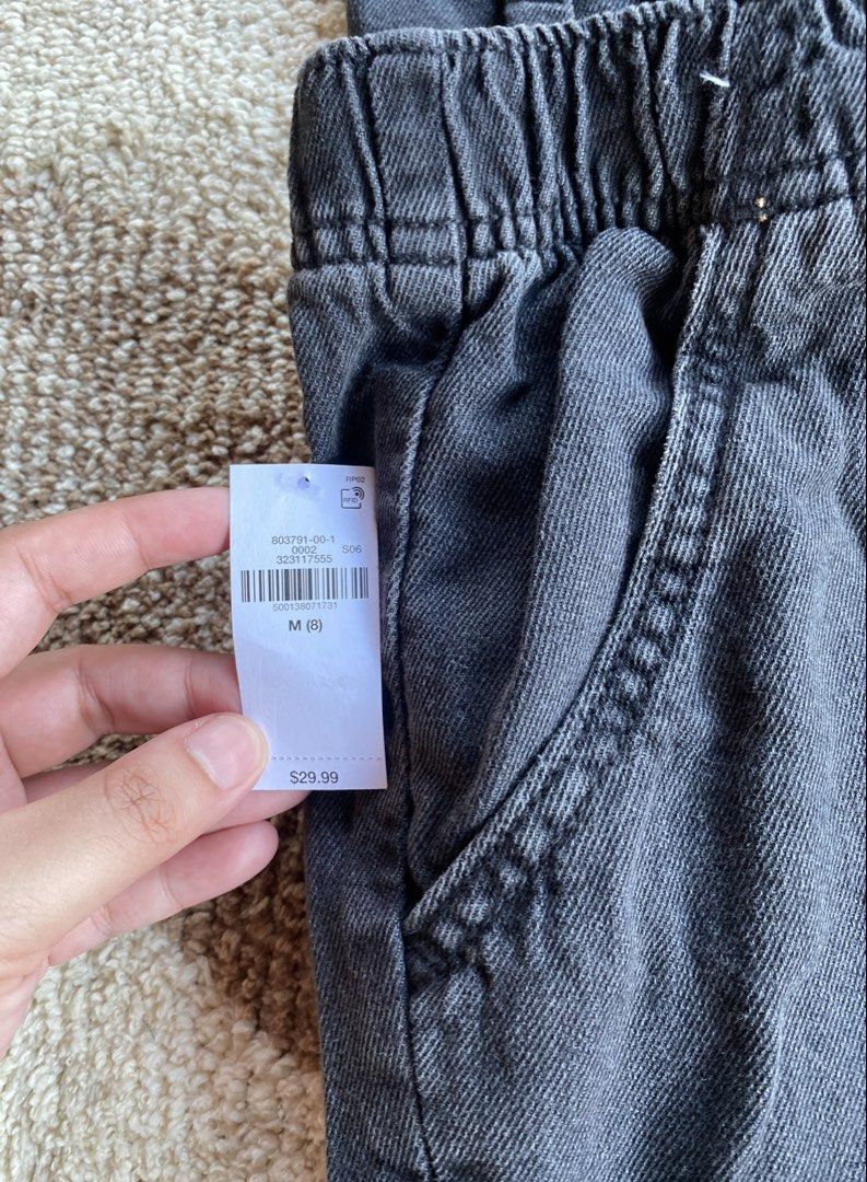 Old Navy Cargo pants for Kids size8 (Category: Babies & Kids Fashion) located in Batangas. Submitted by lux_kimmy (Listing ID 1471045850, Image 2). Description: - Brand: Old Navy - Item: High-Rise Cargo Pants for Kids - Size: 8 (Medium) - Color: Washed Dark Gray / Black Denim - Condition: Brand new with tags (BNWT) - Features: Comfortable elastic waistband, multiple utility cargo pockets, trendy relaxed fit.