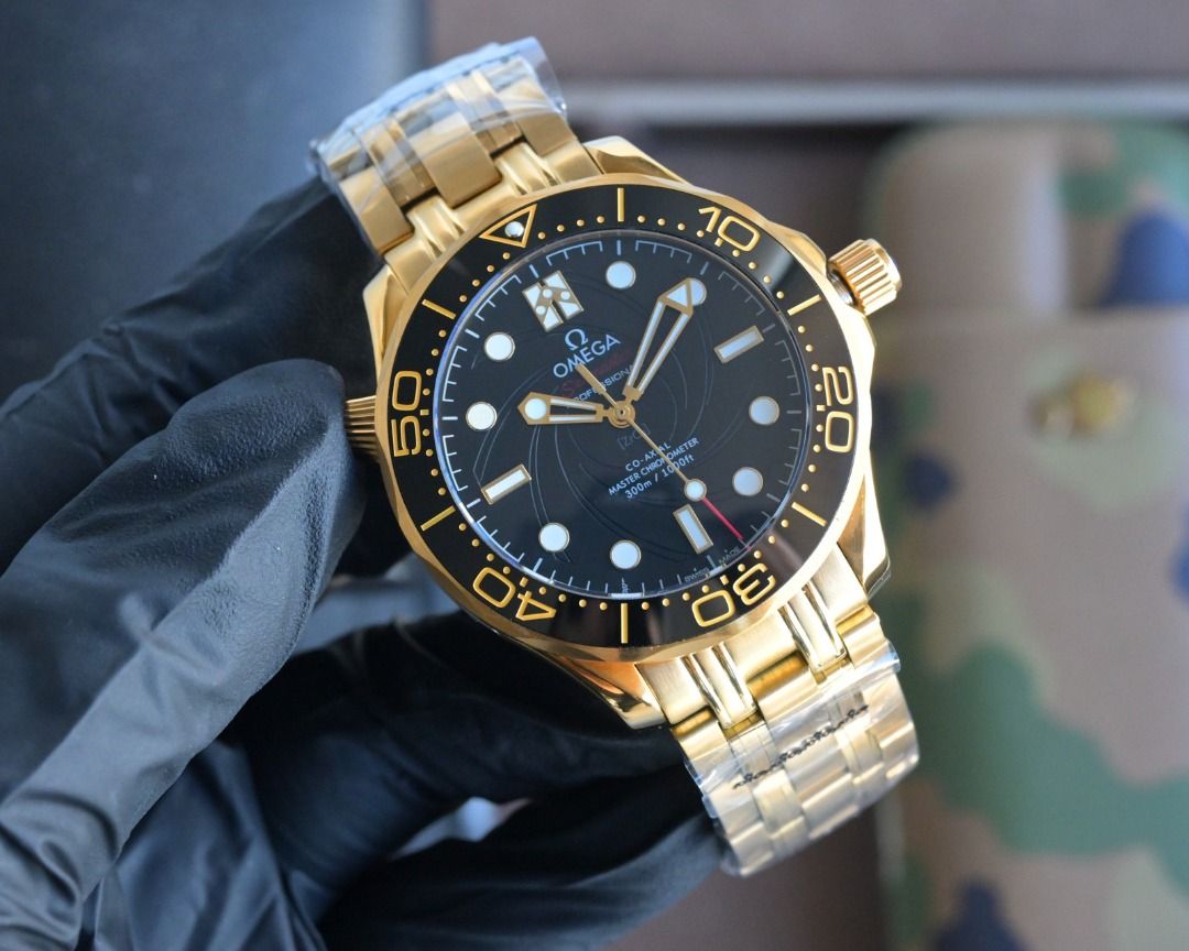 OMEGA Seamaster Diver 300M James Bond 007 (Category: Luxury Watches) located in Mandaluyong City. Submitted by grandfalcon-10f0a8 (Listing ID 1471022346, Image 2). Description: - Model: Omega Seamaster Diver 300M James Bond Limited Edition - Condition: Brand new, still wrapped in factory plastic - Material: Solid gold case and matching metal bracelet - Dial: Classic no-date black dial with gun barrel spiral pattern, luminous hands, and hour marke