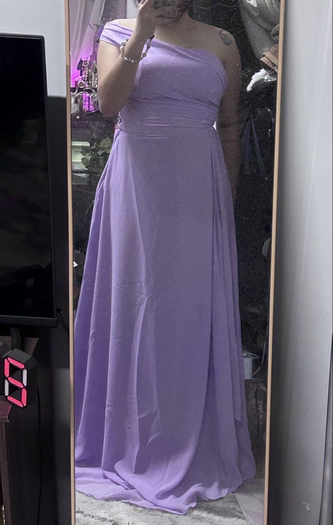 One-Shoulder Maxi Dress (Category: Dresses) located in Davao. Submitted by paula.bbb (Listing ID 1471067552, Image 1). Description: - Color: Lavender - Size: Waist 29 in - Design: One-shoulder with draped pleated bodice - Condition: Worn once for a wedding, no flaws.
