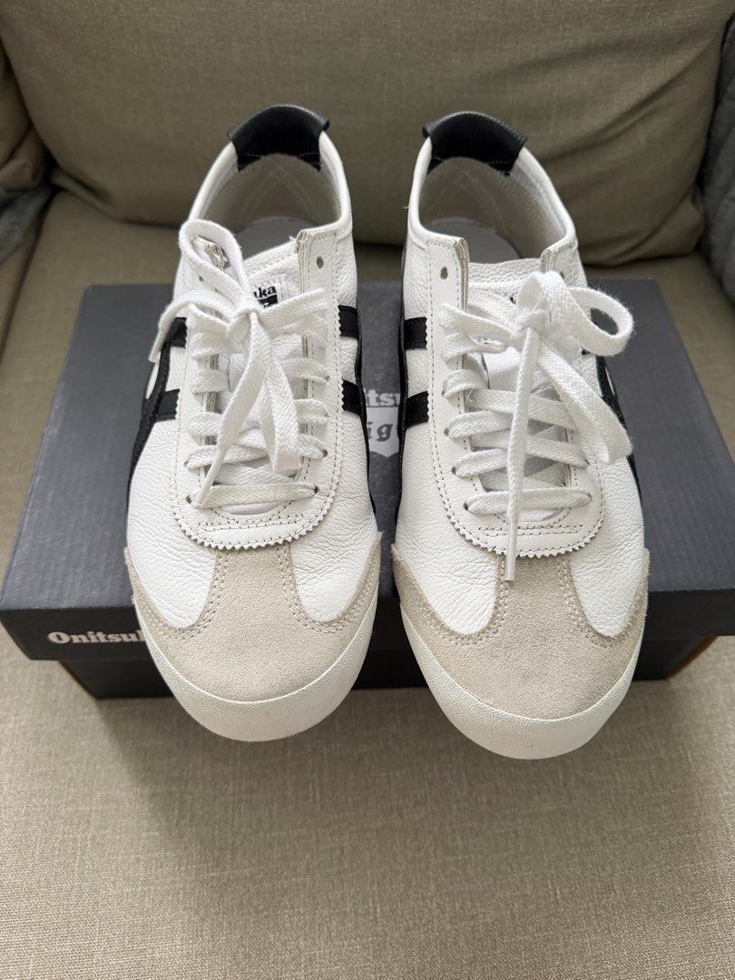 Onitsuka Tiger Mexico 66 White Black (Category: Sneakers) located in Quezon City. Submitted by babybubots (Listing ID 1471017370, Image 2). Description: - Brand: Onitsuka Tiger - Model: Mexico 66 - Colorway: White leather upper with black tiger stripes and grey suede overlays - Condition: Excellent, soles are clean - Size: 8 Mens / 9.5 Womens - Inclusions: Original shoebox included - Authentic - Bought from Japan MOP: Gcash, Maya, RCBC MOD: Lalam