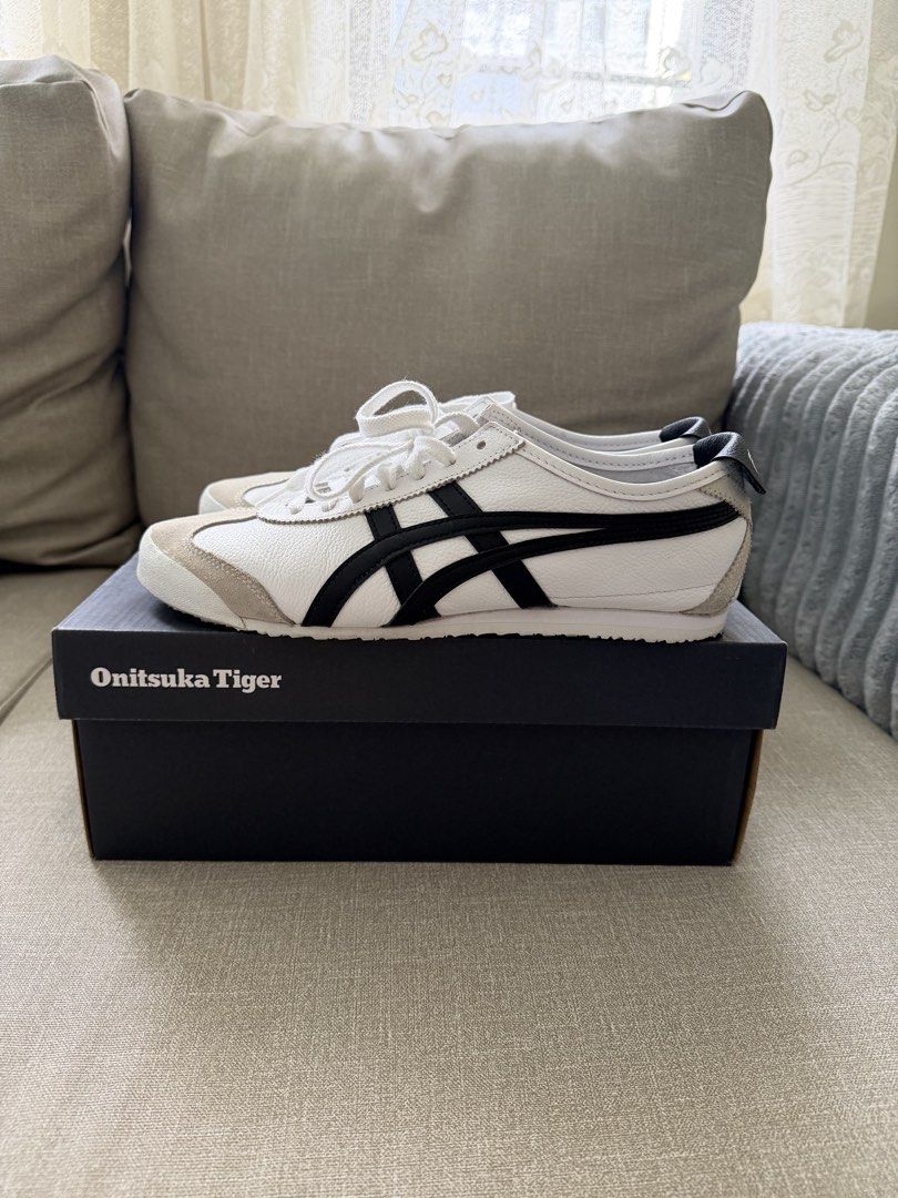 Onitsuka Tiger Mexico 66 White Black (Category: Sneakers) located in Quezon City. Submitted by babybubots (Listing ID 1471017370, Image 3). Description: - Brand: Onitsuka Tiger - Model: Mexico 66 - Colorway: White leather upper with black tiger stripes and grey suede overlays - Condition: Excellent, soles are clean - Size: 8 Mens / 9.5 Womens - Inclusions: Original shoebox included - Authentic - Bought from Japan MOP: Gcash, Maya, RCBC MOD: Lalam