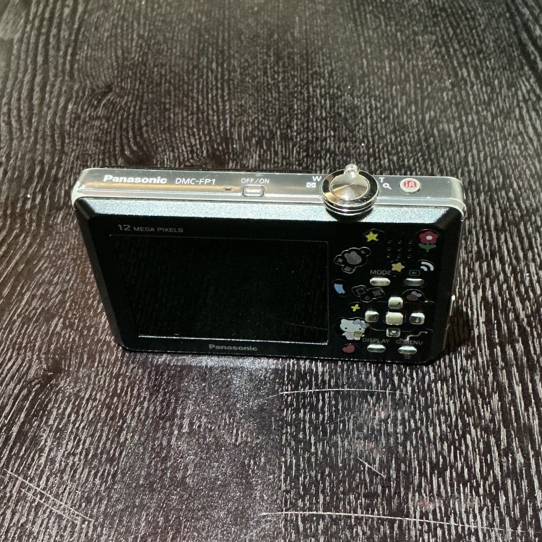 Panasonic Lumix DMC-FP1 📸 (Category: Cameras) located in Manila. Submitted by bebichichiz (Listing ID 1470260529, Image 3). Description: Details: - Model: Panasonic Lumix DMC-FP1 - Condition: Working - Display: Working - Cosmetic condition: Signs of use and stickers (can be removed) - Battery: Included - Charger: No compatible charger available Please note: - The camera works, but I don't have the proper charger for the battery. Selling as-is wi