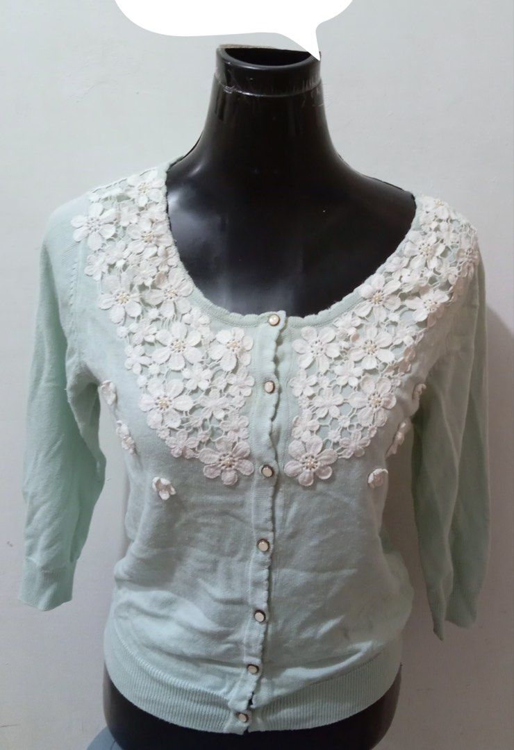 Pattern Mint Green Floral Lace Cardigan (Category: Coats, Jackets and Outerwear) located in Quezon City. Submitted by charitoo369 (Listing ID 1471117483, Image 1). Description: - Brand: Pattern - Color: Mint green - Details: White floral lace appliqué and pearl accents on the chest - Closure: Button-down front with matching buttons - Sleeves: Three-quarter length - Hem: Ribbed cuffs and hemline - Fabric: Soft knit - Condition: Mint/Great layering