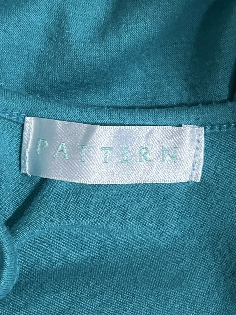 PATTERN Teal Short Sleeve Top Size M (Category: Blouses) located in Tuguegarao City. Submitted by love_clothies (Listing ID 1471095771, Image 3). Description: - Brand/Label: Pattern - Color: Teal - Size: Japanese Size M - Material: 65% polyester, 30% rayon, 5% polyurethane - Design: Scoop neckline with puffy, gathered sleeves - Back detail: Adorable tie-up bow - Condition: Excellent / Great for casual or smart-casual wear.