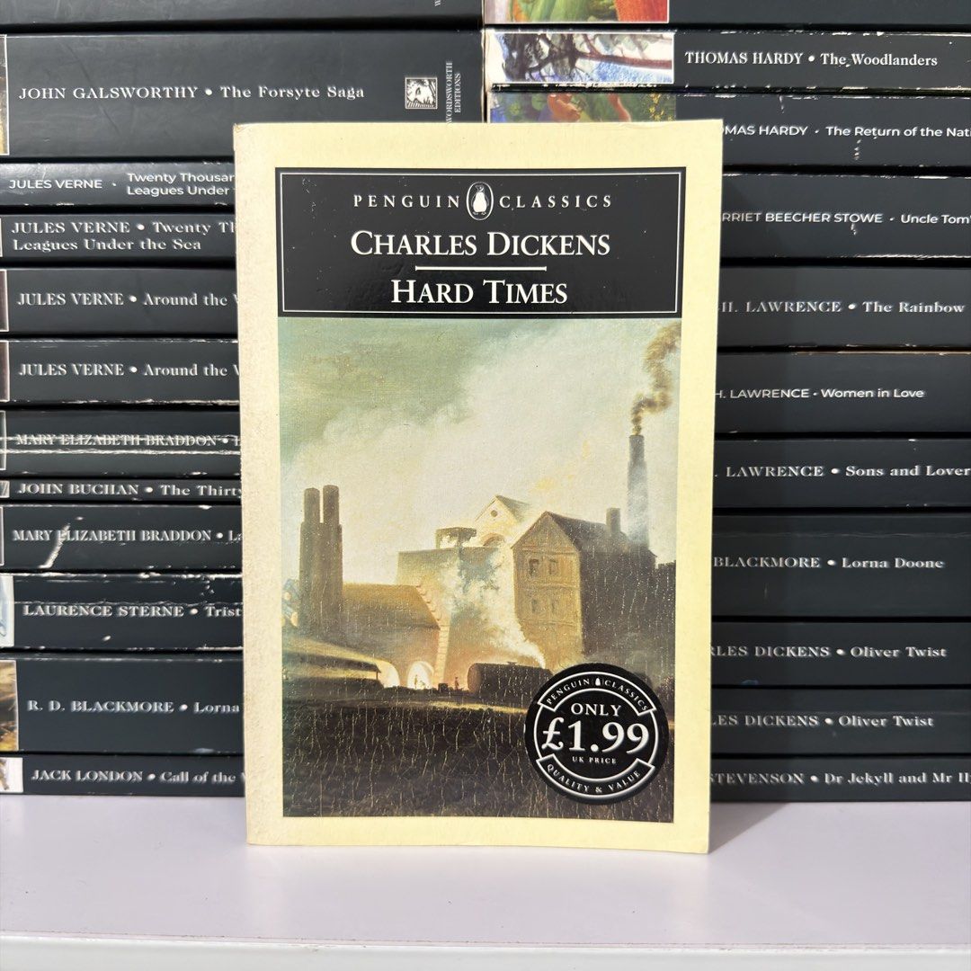 Penguin Classics Hard Times by Charles Dickens (Category: Storybooks) located in Lingayen. Submitted by readwjane (Listing ID 1471091516, Image 1). Description: - Title: Hard Times by Charles Dickens - Edition: Penguin Classics Paperback - Cover: Features a striking industrial town illustration with £1.99 UK price tag - Condition: Great addition to any bookshelf or literature collection - Location: Metro Manila (ships nationwide).