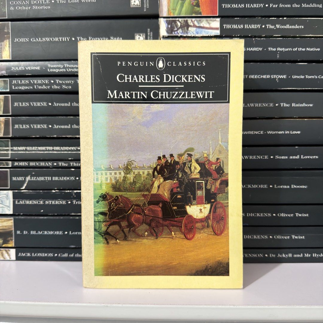 Penguin Classics Martin Chuzzlewit by Charles Dickens (Category: Storybooks) located in Lingayen. Submitted by readwjane (Listing ID 1471091526, Image 1). Description: - Title: Martin Chuzzlewit by Charles Dickens - Edition: Penguin Classics paperback - Cover: Vintage artwork featuring a horse-drawn carriage - Condition: Great addition to any classic book collection - Format: Standard paperback.