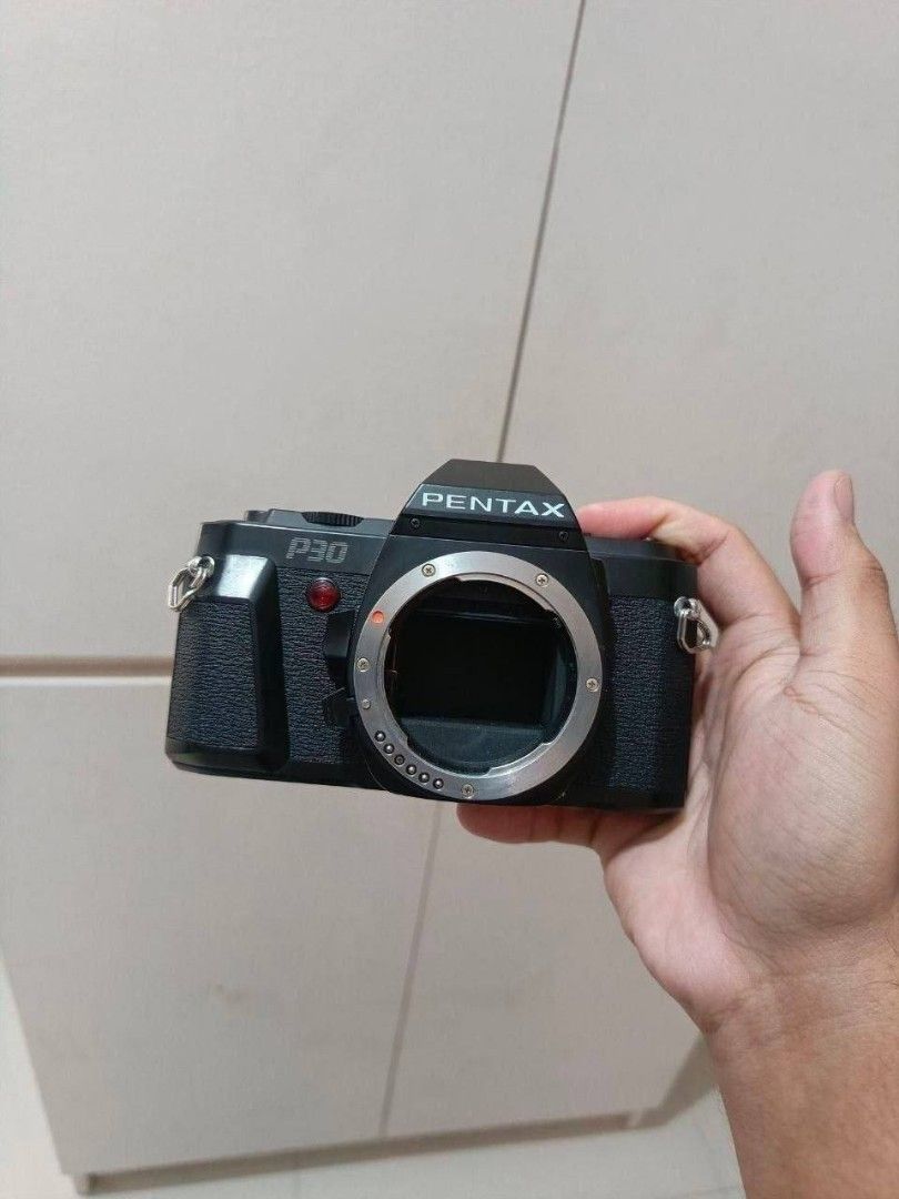 Pentax P30 SLR Film Camera (Category: Cameras) located in Batangas. Submitted by batangascitywatches (Listing ID 1470939917, Image 2). Description: Pentax P30 • 35mm SLR Film Camera • 18-55 Lens • Fixed Eye-Level Pentaprism • Center-Weighted TTL • Uses LR44/SR44 • Clear Output On Viewfinder • In Good Condition Inclusion • Original 18-55 Pentax Lens Pure Cash : 3k Swapping Value : 4k FIXED PRICE *FILM CAMERA, NOT A DSLR.