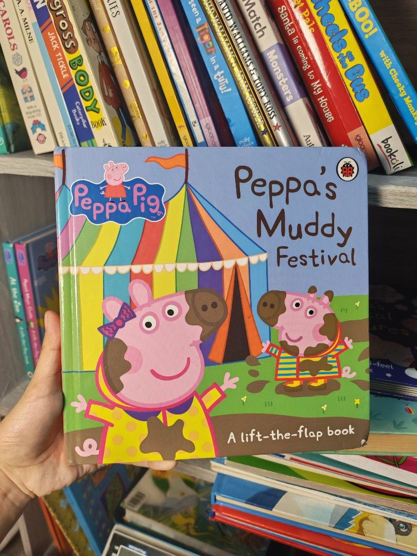 peppa pig HCBB (Category: Children's Books) located in Manila. Submitted by harizbooks (Listing ID 1471033975, Image 3). Description: Bundle of Peppa Pig interactive books for kids. Includes titles like At the Zoo, Magic Castle, Muddy Festival, and Magical Creatures. Features lift-the-flap elements and touch-and-feel textures inside. Great stories for bedtime reading or keeping toddlers entertained. Pages are intact and clean. Smoke-free home..