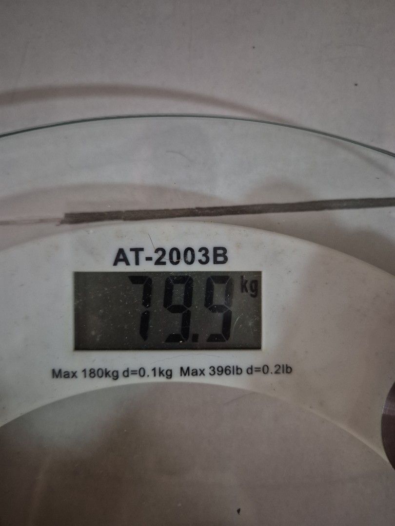 Personal Scale AT-2003B Digital Bathroom Scale (Category: Health Monitors & Weighing Scales) located in Manila. Submitted by matthew34567 (Listing ID 1471004391, Image 3). Description: - Model: AT-2003B Digital Personal Scale - Max capacity: 180kg - Design: Clear glass platform with stylish silver circular pad accents - Display: Clear digital screen for accurate weight readings - Condition: Fully operational and ready to use - Packaging: Comes wi