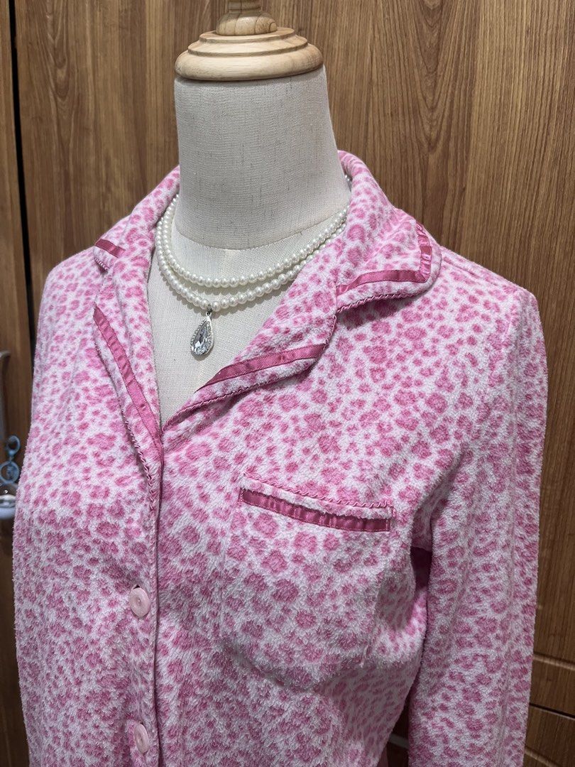 Pink leopard print (Category: Coats, Jackets and Outerwear) located in Manila. Submitted by brightwind_62659f (Listing ID 1471094301, Image 1). Description: - Fluffy pink and white leopard print design - Classic collar with satin pink trim and matching chest pocket - Front button closure with cute pink round buttons - Long sleeves made from super soft and cozy material - Ideal for lounging at home or sleeping in comfort.