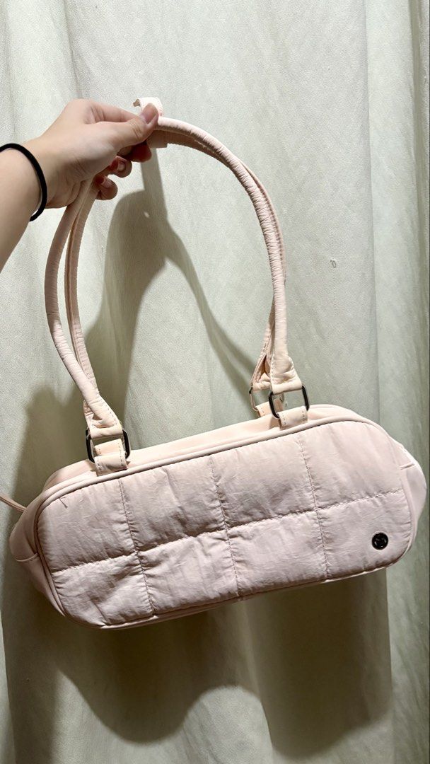 Pink Quilted Shoulder Bag with Dual Straps (Category: Shoulder Bags) located in Manila. Submitted by ky.preloved1515 (Listing ID 1470944586, Image 3). Description: - Color: Light pink - Style: Quilted shoulder bag with silver hardware - Straps: Long dual straps - Closure: Top zip closure plus back zip pocket - Interior: Smooth lining with mesh storage pockets - Capacity: Roomy enough for daily essentials - Condition: Clean condition all around.