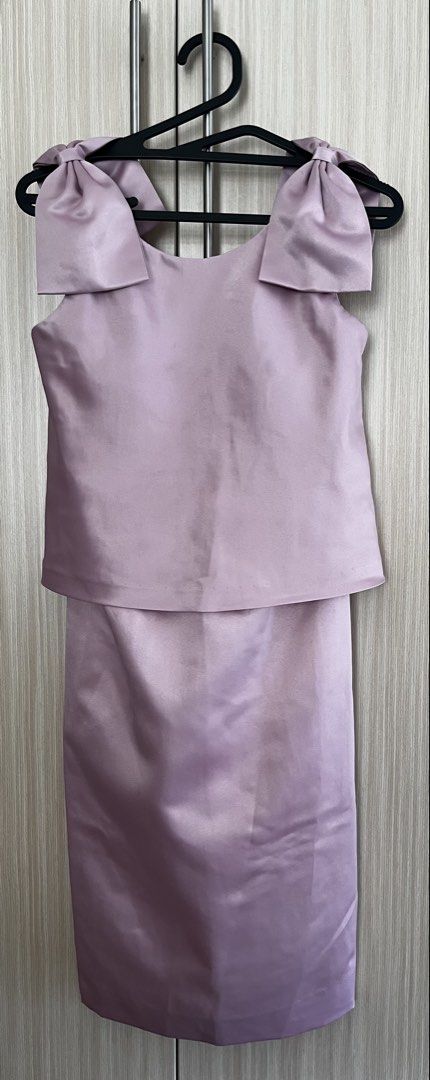 Pink Satin Dress with Bow Straps (Category: Dresses) located in Manila. Submitted by lorenasant37621 (Listing ID 1470985255, Image 1). Description: - Color: Dusty Pink - Material: Smooth satin with subtle sheen - Design: Thick bow shoulder straps, layered overlay top, fitted skirt - Back detail: Unique draped pleat design with concealed zipper - Length: Approx. 36 inches - Perfect for weddings, parties, and special occasions!.