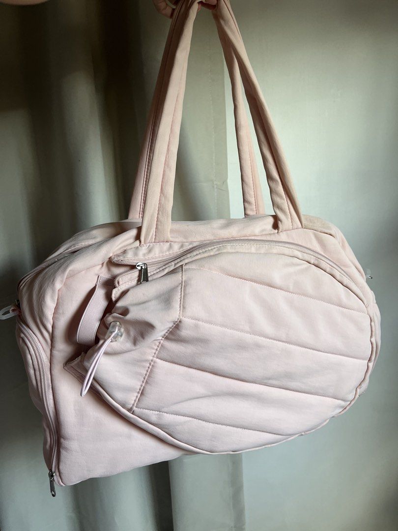 Pink Sports Duffel Bag (Category: Shoulder Bags) located in Davao. Submitted by bagyongchloie (Listing ID 1471032139, Image 2). Description: Selling my preloved pink duffel bag. Used but in good condition. • 42L • can fit 2 tennis racquets • with shoe compartment • with water bottle compartment • with 15.6" laptop sleeve • with wet & dry bag • unused adjustable strap RFS: extra bag, not being used anymore 🙂 Df c/o buyer.