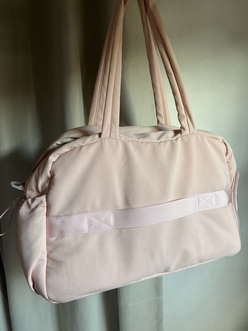 Pink Sports Duffel Bag (Category: Shoulder Bags) located in Davao. Submitted by bagyongchloie (Listing ID 1471032139, Image 3). Description: Selling my preloved pink duffel bag. Used but in good condition. • 42L • can fit 2 tennis racquets • with shoe compartment • with water bottle compartment • with 15.6" laptop sleeve • with wet & dry bag • unused adjustable strap RFS: extra bag, not being used anymore 🙂 Df c/o buyer.