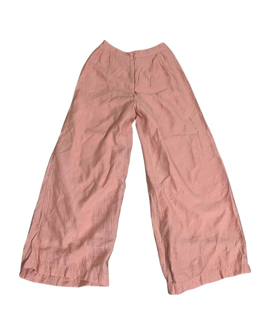 Pink wide-leg trousers pants (Category: Jeans) located in Alicia. Submitted by lovedby.icy (Listing ID 1471060128, Image 1). Description: | with side zipper | fully lined with white fabric (not see-through).