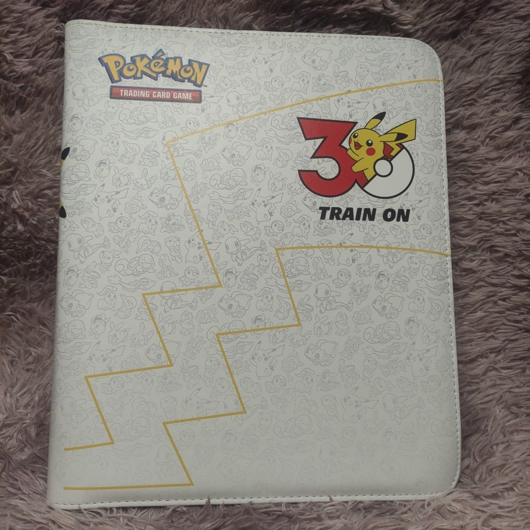 Pokemon 30th anniversary TCG 3x3 binder 360 pockets (Category: Trading Cards Accessories) located in Quezon City. Submitted by findyourtreasure10 (Listing ID 1471069506, Image 1). Description: 📌 **Please read before Purchasing** - good condition - design of 30th anniversary pokemon (not official merchandise custom only) - 20 PCs sheets - 3x3 = 9 pockets - 360 PCs pockets (front and back) Kindly manage your expectations. What you see is exactly w