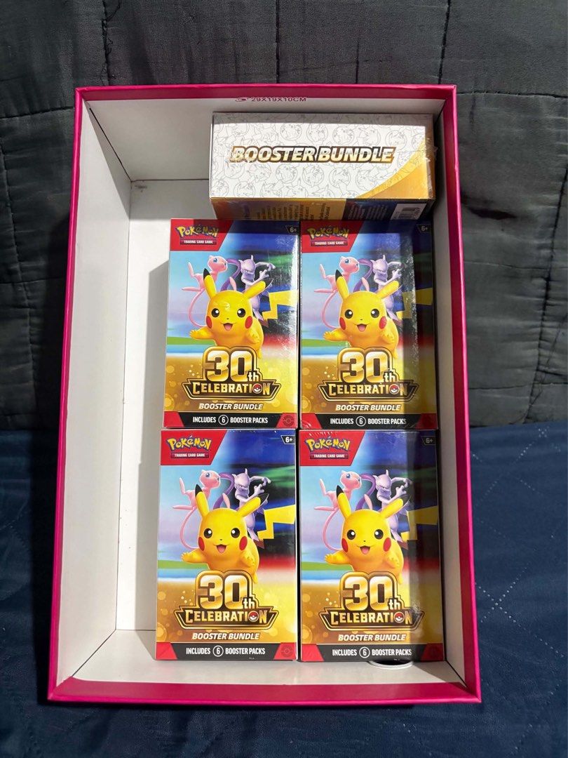 Pokémon 30th Celebration Booster Pack English (Category: Card Packs) located in Manila. Submitted by whosm14 (Listing ID 1471015726, Image 1). Description: Five sealed Pokémon 30th Celebration booster bundles included in this lot. Each box contains six booster packs, offering a great opportunity to pull classic cards and celebrate the franchise's history. These items are factory sealed and in pristine condition, perfect for collectors looking to 