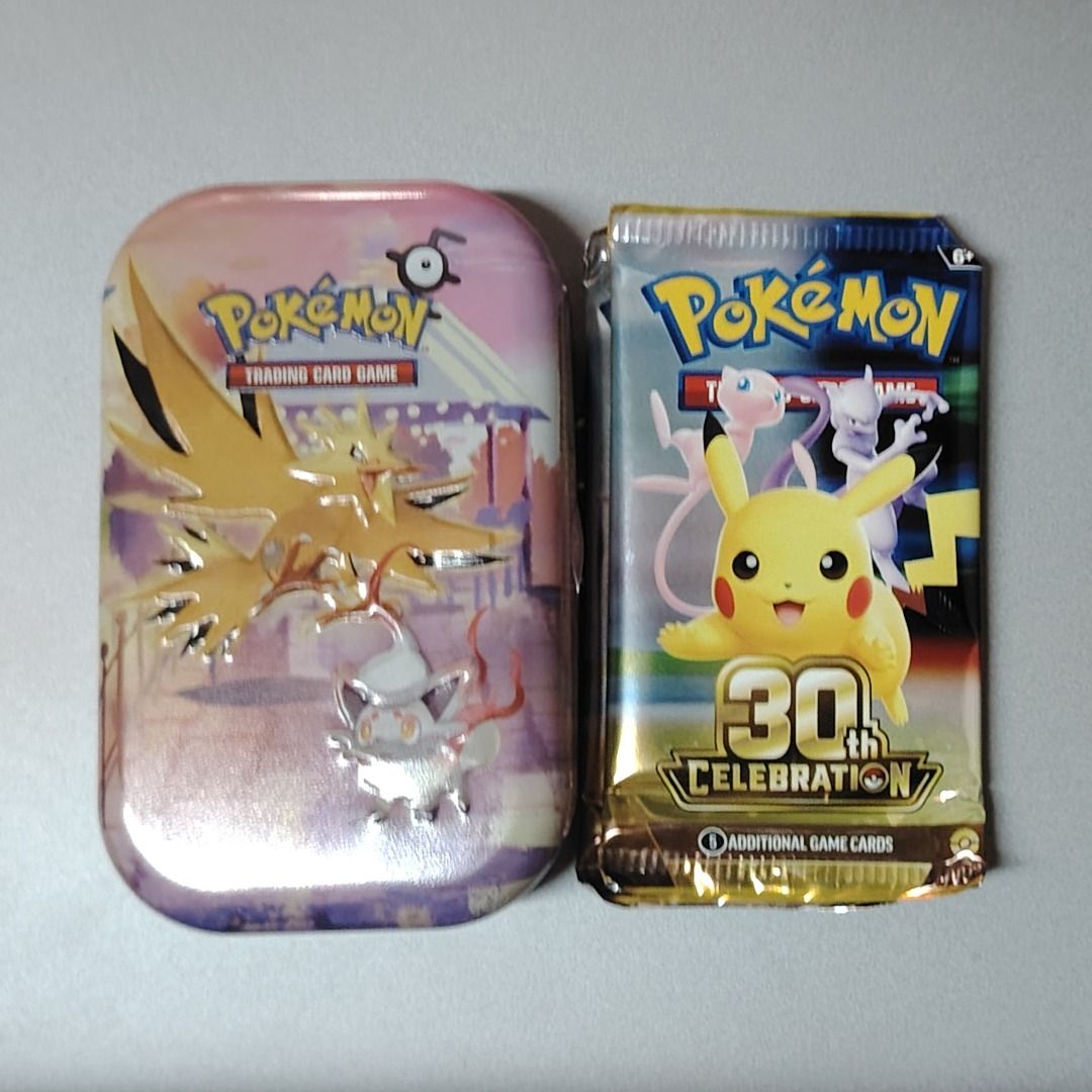 Pokémon 30th Celebration Mini Tin 2 Booster Pack English (Category: Card Packs) located in San Fernando. Submitted by kondotime (Listing ID 1470985033, Image 1). Description: May maliit na cut/snip as per TRU policy 45 pesos lang sf through JNT pag NCR Can meetup within Binondo area only.