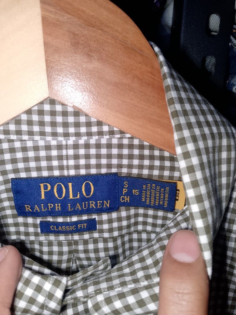 Polo Ralph Lauren Green Gingham Button Down Shirt Size S (Category: Tshirts & Polo Shirts ) located in Manila. Submitted by mjthrifted_second (Listing ID 1470988992, Image 2). Description: - Brand: Polo Ralph Lauren - Style: Classic fit button-down shirt - Pattern: Green and white gingham check - Size: Small (15) -Dimes: 22/29 - Material: 91% cotton, 9% elastane (with stretch) - Details: Long sleeves with button cuffs, button-down collar, signatu