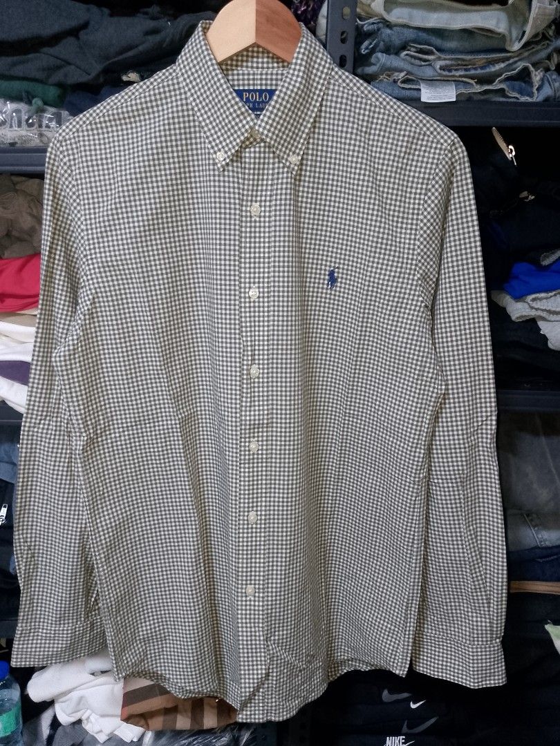 Polo Ralph Lauren Green Gingham Button Down Shirt Size S (Category: Tshirts & Polo Shirts ) located in Manila. Submitted by mjthrifted_second (Listing ID 1470988992, Image 1). Description: - Brand: Polo Ralph Lauren - Style: Classic fit button-down shirt - Pattern: Green and white gingham check - Size: Small (15) -Dimes: 22/29 - Material: 91% cotton, 9% elastane (with stretch) - Details: Long sleeves with button cuffs, button-down collar, signatu