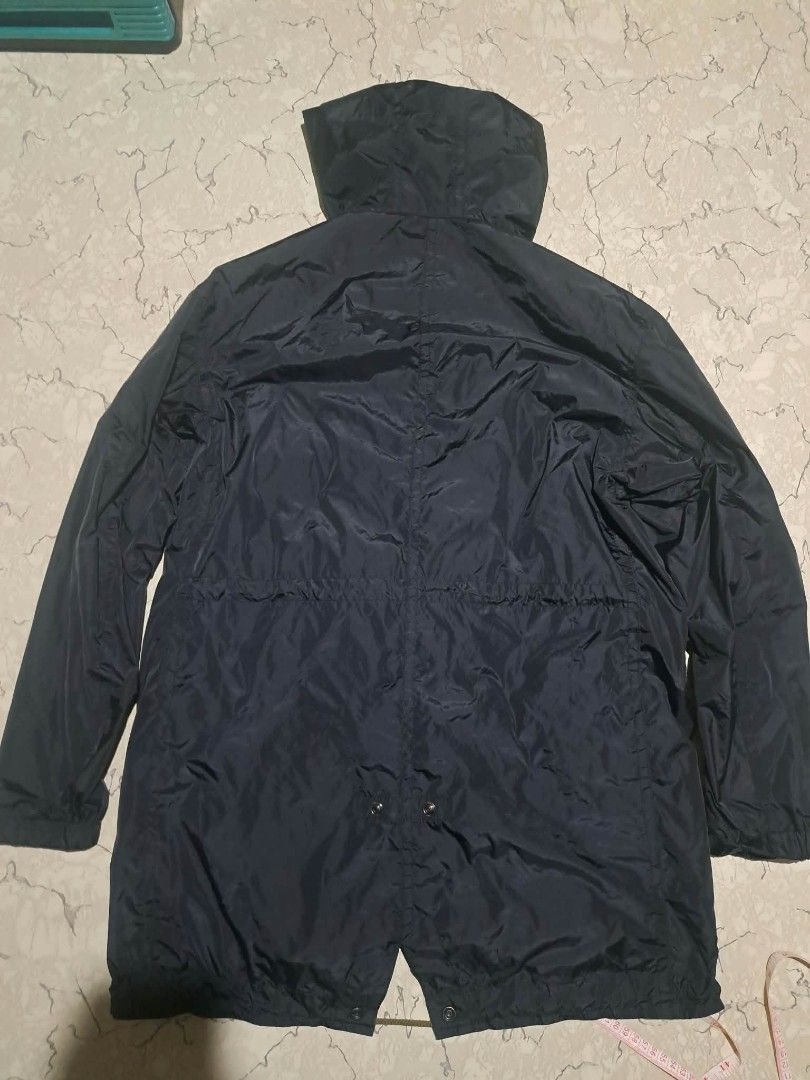 Polo Ralph Lauren Jacket Navy Yellow Size M (Category: Coats, Jackets and Outerwear) located in Manila. Submitted by alexson10 (Listing ID 1471068377, Image 2). Description: - Brand: Polo Ralph Lauren - Color: Navy blue with bright yellow hood and interior lining - Size: Medium (Made in Indonesia) - Closure: Front zipper with button flap overlay - Features: Adjustable drawstring waist and hem, side pockets with button flaps, and adjustable cuffs 