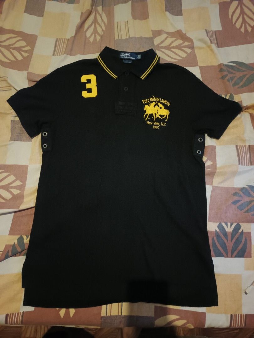 Polo ralph Lauren polo shirts (Category: Activewear) located in Odiongan. Submitted by thriftngo26 (Listing ID 1471113407, Image 1). Description: The image shows a Polo Ralph Lauren "New York" Big Pony polo shirt in black with yellow accents, often referred to in streetwear circles as the "Chief Keef style" crest polo..
