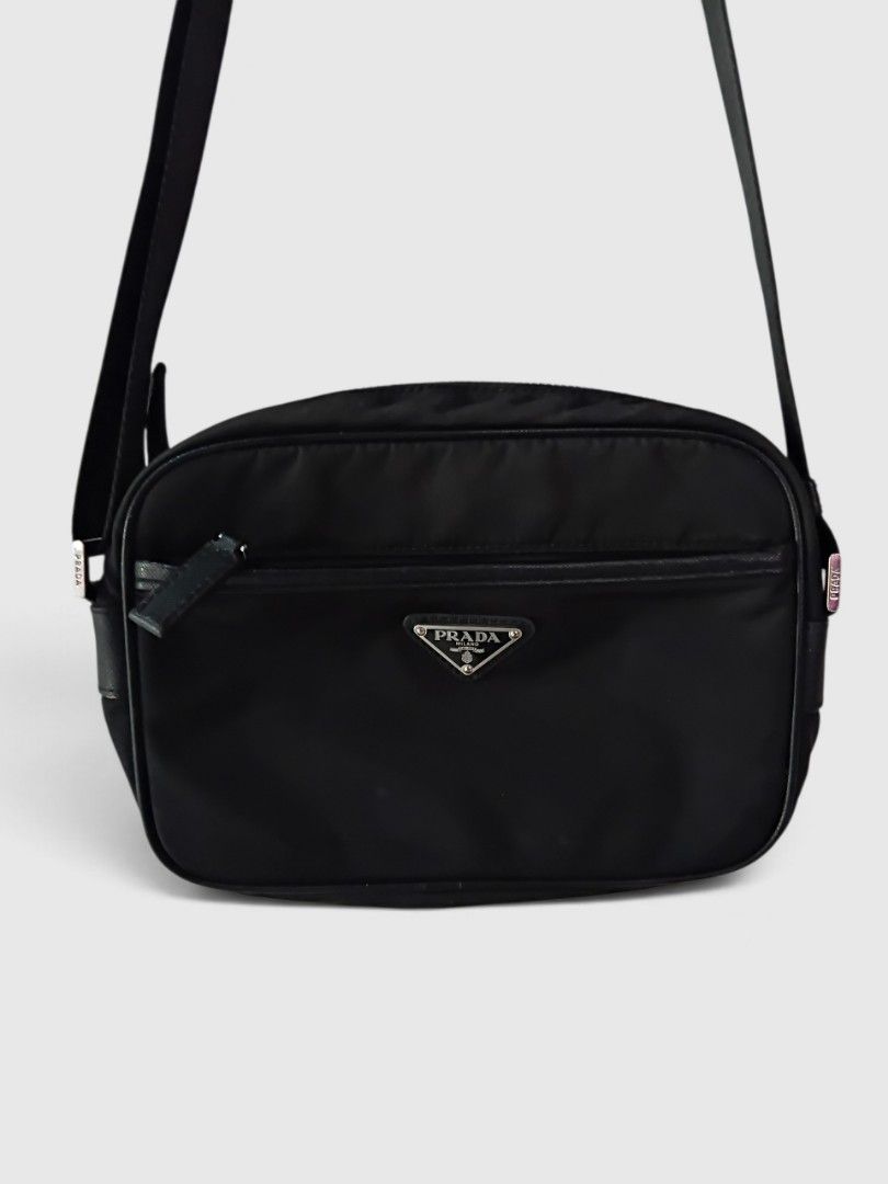Prada (Category: Luxury Bags & Wallets) located in Malasiqui. Submitted by v.hype (Listing ID 1470968092, Image 3). Description: Prada issue: minimal sign of used sa may front body Ng bag check nyo lang pO sa details pic price: 8500 pesos + ship.