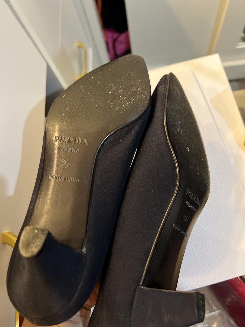 Prada Black Pointed Toe Heels Size 36 (Category: Heels) located in Makati City. Submitted by mariaasevilla0622eb (Listing ID 1471095944, Image 3). Description: - Brand: Prada - Style: Pointed toe kitten heels / Slip-on - Color: Classic Black - Size: 36 (Made in Italy) - Material: Vero cuoio leather soles with gold Prada Milano midsoles stamping - Condition: Good pre-loved condition with some wear on the bottom soles - Perfect for: Workwear, forma