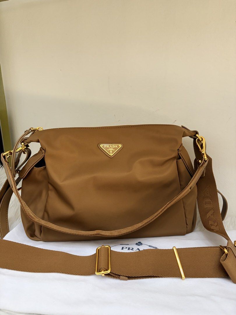 Prada Explore Crossbody (Category: Cross-body Bags) located in Dasmarinas. Submitted by jadasy_vintagefinds (Listing ID 1470977045, Image 1). Description: Prada Explore medium in great condition near large. Japan auction sourced. No card no cert no receipt 📏 35 x 23 x 13cm ‼️PLEASE TAKE TIME TO READ‼️ 🛑✋🏻 DON’T MAKE AN OFFER IF UNSURE. 🛑✋🏻 IF IN DOUBT, DON’T BUY. WILL SAVE US BOTH SOME TIME. ❌NO COD for No Profile Reviews/Ratings/locked prof