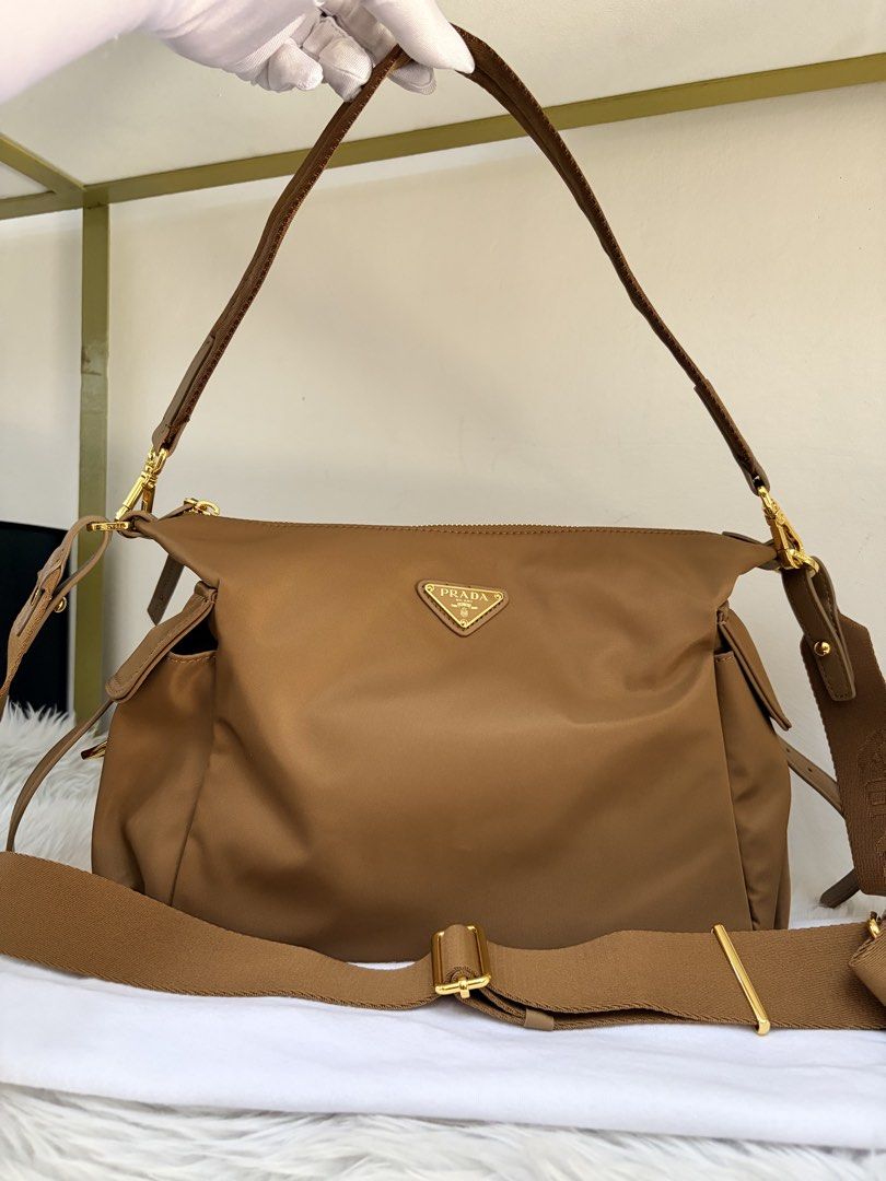 Prada Explore Crossbody (Category: Cross-body Bags) located in Dasmarinas. Submitted by jadasy_vintagefinds (Listing ID 1470977045, Image 2). Description: Prada Explore medium in great condition near large. Japan auction sourced. No card no cert no receipt 📏 35 x 23 x 13cm ‼️PLEASE TAKE TIME TO READ‼️ 🛑✋🏻 DON’T MAKE AN OFFER IF UNSURE. 🛑✋🏻 IF IN DOUBT, DON’T BUY. WILL SAVE US BOTH SOME TIME. ❌NO COD for No Profile Reviews/Ratings/locked prof
