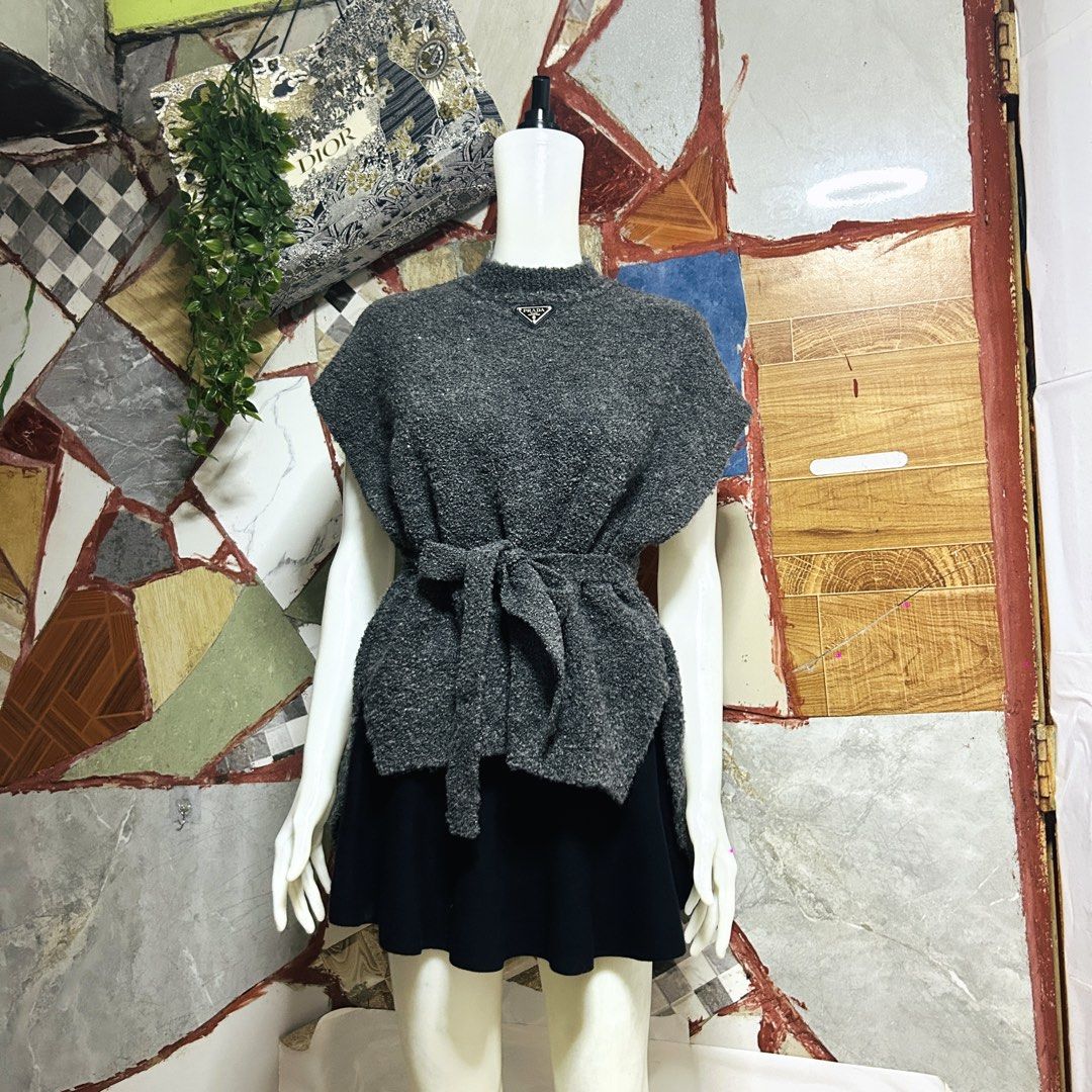 Prada knit (Category: Luxury Apparel) located in Baguio. Submitted by kckc_luxury (Listing ID 1471094473, Image 2). Description: 🌸 TINY PINK SPOTS ARE LENS DAMAGE, NOT CLOTH STAINS ————————— ❗️KINDLY READ BEFORE MAKING AN OFFER❗️ LISTING DETAILS size:Large width x length (inches):25x23-29 condition: EXCELLENT --- MOP: Gcash / BPI MOD: J&T / JRS LOCATION: Baguio City --- NOTE: • Manage your expectations • Photos did not go under any edit but colo
