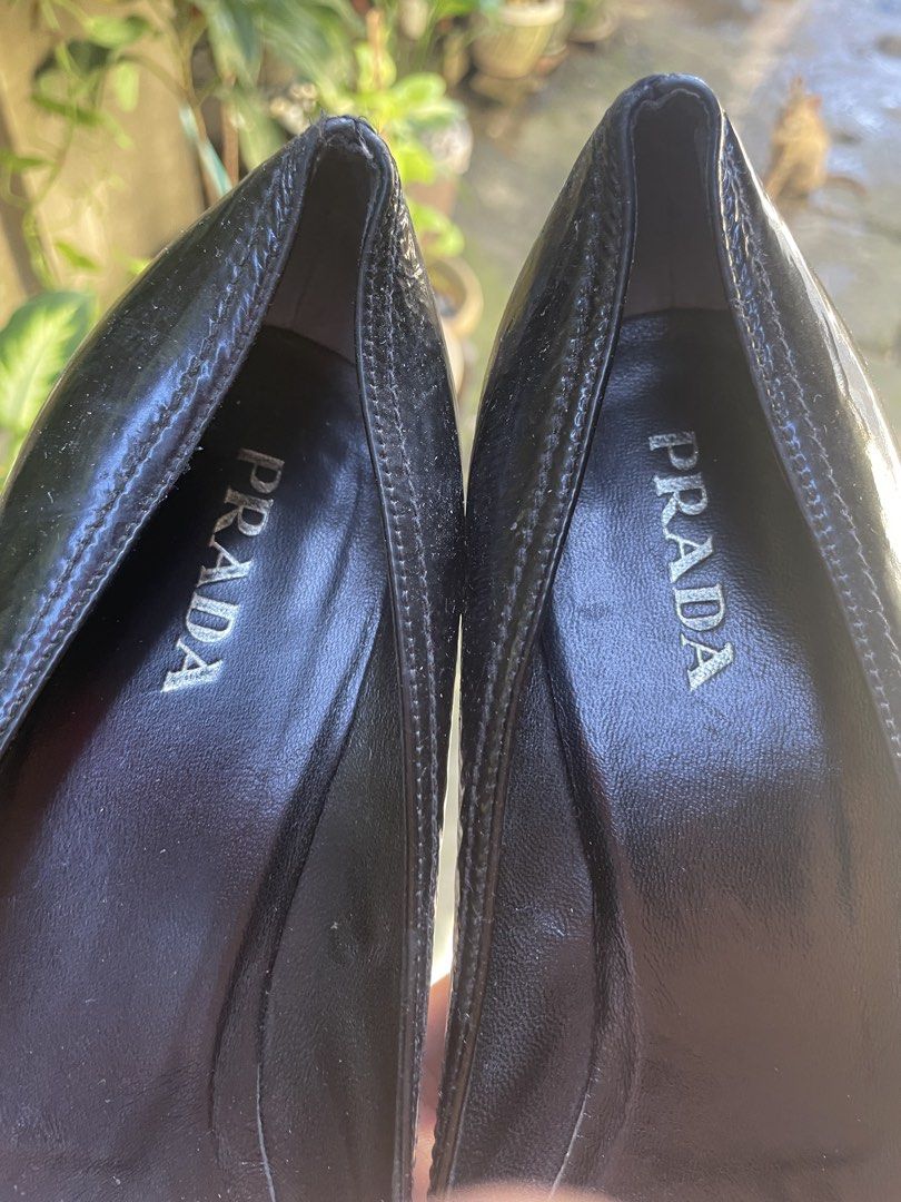Prada Leather Heels Black (Category: Sneakers & Footwear) located in Naga. Submitted by black-market00 (Listing ID 1470993434, Image 3). Description: Prada leather heels black Size 38 1/2 Made in italy Condition 9 Minimal scratch Sign of usage .