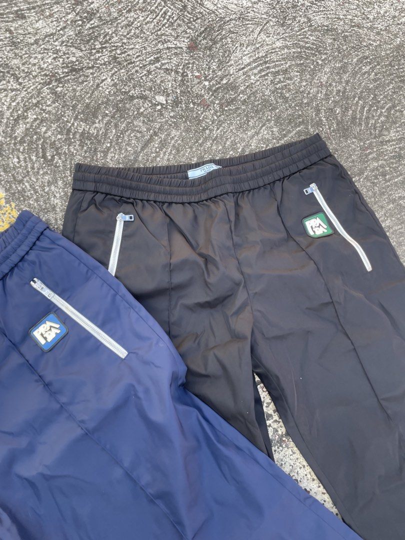 Prada Nylon pants rubber logo(Authentic) (Category: Luxury Apparel) located in Alegria. Submitted by deniseeee.21 (Listing ID 1470938672, Image 2). Description: 12k for bundle 7k if each so take it as bundle so you can have a huge discount AUTHENTIC LIKE NEW CONDITION SIZE 42s .