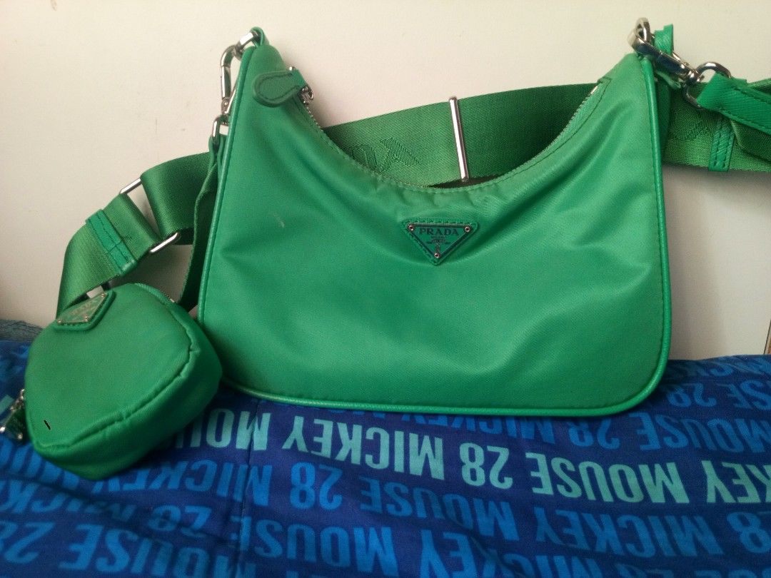 Prada Re-Edition 2005 Green Nylon Bag (Category: Luxury Bags & Wallets) located in Manila. Submitted by littlelove25 (Listing ID 1470988687, Image 1). Description: - Authentic Green Prada Re-Edition 2005 shoulder bag in durable nylon - Includes matching detachable pouch and stylish key ring tag - Adjustable green fabric strap with sleek metal hardware - Secure top zip closure for everyday use - Interior lined with signature green jacquard fabric 