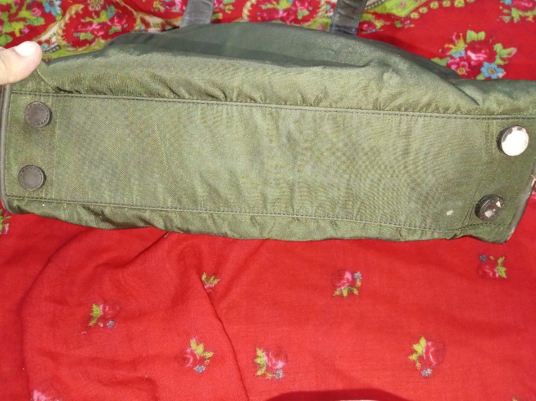 PRADA tessuto Nylon olive green shoulder bag (Category: Luxury Bags & Wallets) located in Malolos. Submitted by shoptokyothrift (Listing ID 1471049136, Image 3). Description: Vintage PRADA tessuto Nylon olive green shoulder bag With white tag With padlock and key As is Please Check all photos carefully.