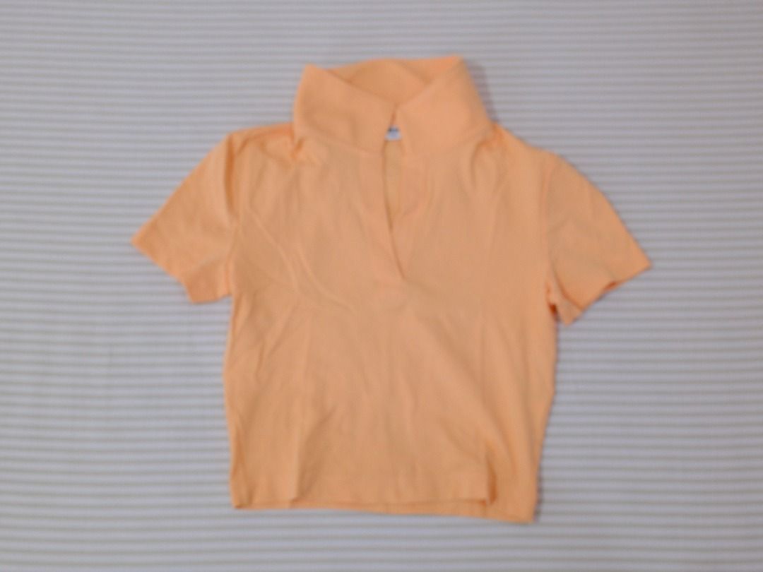 Pre-Loved Clothes | Uniqlo Light Orange Collared Crop Top (Category: Shirts) located in Obando. Submitted by chokbotsss (Listing ID 1471007759, Image 1). Description: Pre-Loved Clothes - Price: 100 - Brand: Uniqlo - Color: Light Orange - Size: M - Issue: None Payment: Gcash/Bank Transfer Delivery: Lalamove/LBC Location: Maysilo, Malabon City.