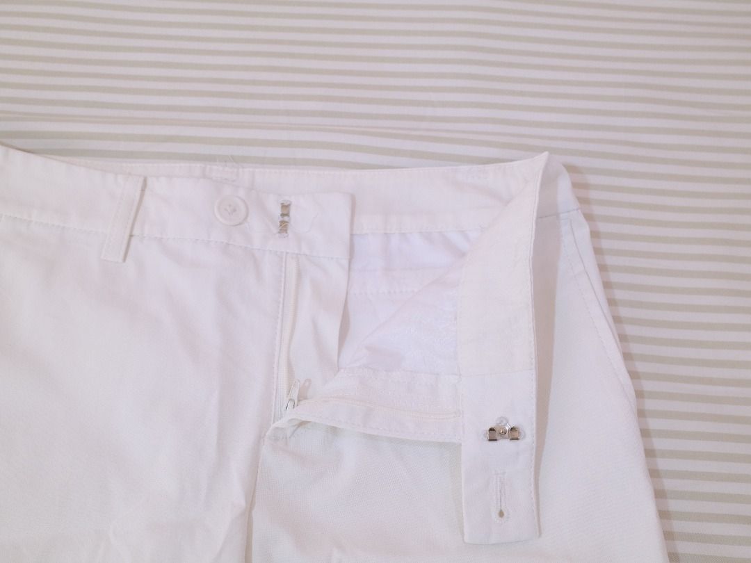 Pre-Loved Clothes | Uniqlo White Trousers (Category: Other Bottoms) located in Obando. Submitted by chokbotsss (Listing ID 1471013137, Image 2). Description: - Brand: Uniqlo - Color: White - Size: 64cm - Material: 80% polyester, 18% cotton, 2% polyurethane - Closure: Standard button and zip fly with inner hook fastening - Features: Clean fabric texture, belt loops included - Origin: Made in China - Condition: Great daily staple piece.