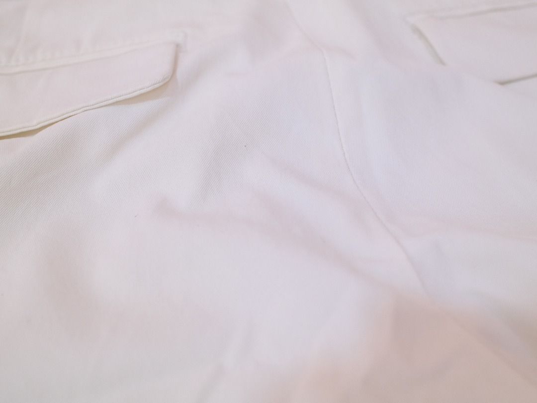 Pre-Loved Clothes | Uniqlo White Trousers (Category: Other Bottoms) located in Obando. Submitted by chokbotsss (Listing ID 1471013137, Image 3). Description: - Brand: Uniqlo - Color: White - Size: 64cm - Material: 80% polyester, 18% cotton, 2% polyurethane - Closure: Standard button and zip fly with inner hook fastening - Features: Clean fabric texture, belt loops included - Origin: Made in China - Condition: Great daily staple piece.