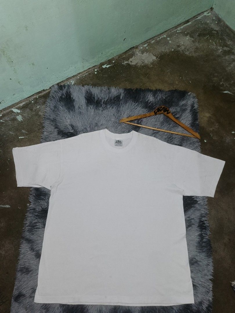 Pro Athletic White T-Shirt 2XL (Category: Tshirts & Polo Shirts ) located in Las Pinas. Submitted by jowardbemi21707 (Listing ID 1471095863, Image 1). Description: Pro Athletic plain white t-shirt. Size 2XL tag at the collar. Short sleeves and classic crew neckline. Solid white base fabric with standard stitching. Assembled in Mexico tag inside. Heavyweight blank tee style..